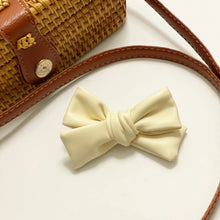 Load image into Gallery viewer, Faux leather &amp; suede bows
